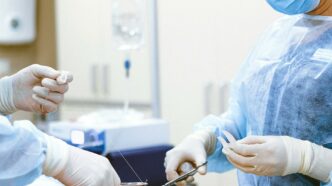 photo of medical professionals wearing personal protective equipment